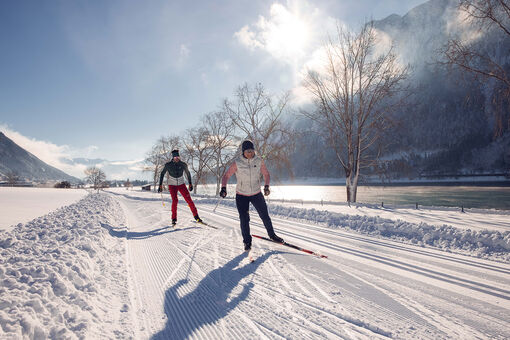 Cross-country ski over 220 kilometres of expertly groomed trails at Lake Achensee, Tirol's largest lake.