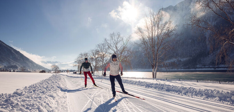 Cross-country ski over 228 kilometres of expertly groomed trails at Lake Achensee, Tirol's largest lake.