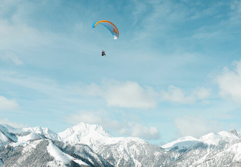 Paragleiten am Achensee Winterlandschaft und den Achensee von oben genießen.