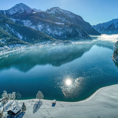 Achenkirch am Achensee affords breathtaking views of the wintry scenery.
