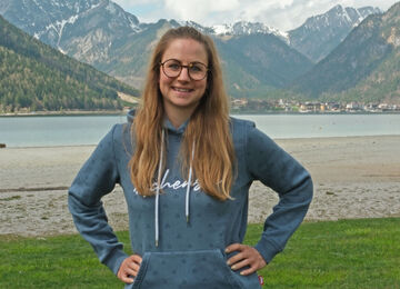 Julia Haidacher of Achensee Tourism on the lakeshore in Maurach am Achensee.