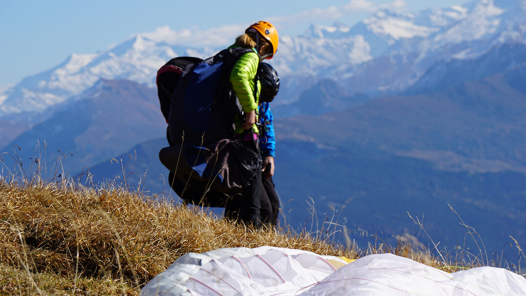Paragliding at Lake Achensee in summer A paragliding adventure lets you enjoy incredible views of the lake and the mountains.