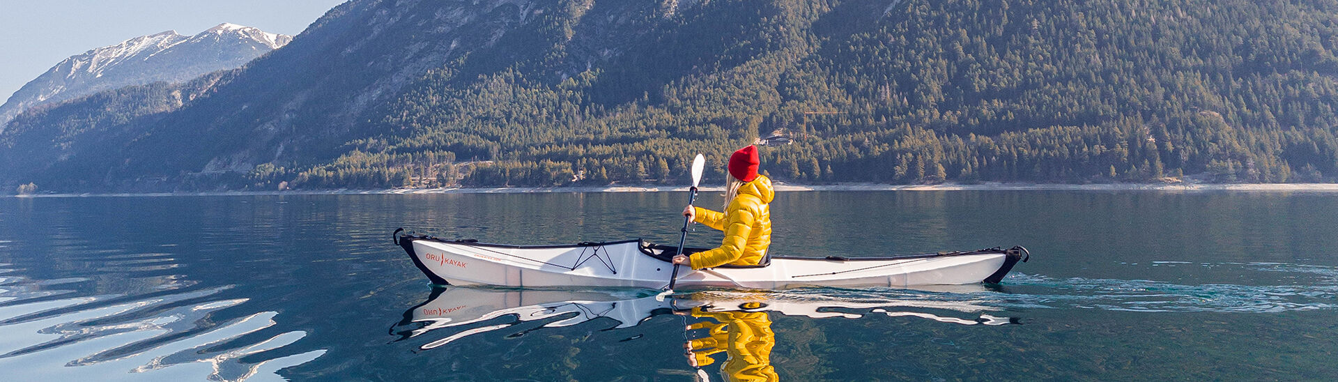 Kayaking on Lake Achensee is an excellent way to experience the stillness of spring.