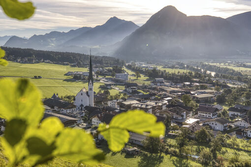 This photo captures the village of Wiesing in the morning sun.