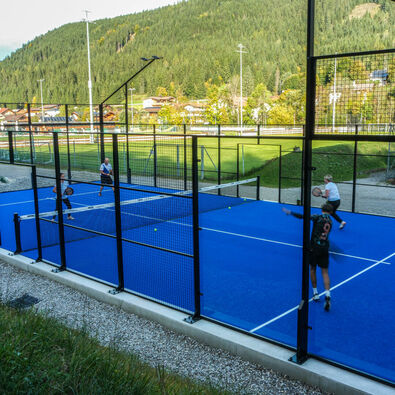 Four players engage in an exciting match on the padel court in Achenkirch am Achensee.