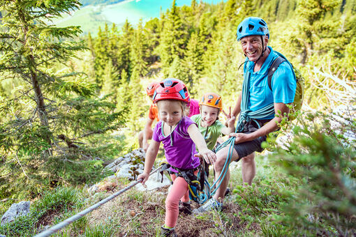 The Felix and Charlotte family-friendly via ferrata in the Rofan mountains at Lake Achensee is a family adventure to remember.