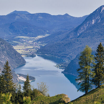 The Bärenkopf in the Nature Park Karwendel affords spectacular views of Lake Achensee and its surrounding villages.