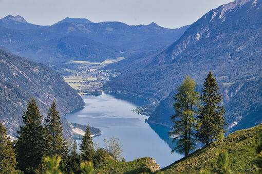 The Bärenkopf in the Nature Park Karwendel affords spectacular views of Lake Achensee and its surrounding villages.