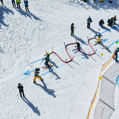 In winter, children complete a course in the Rofan mountains on touring skis or downhill skis.