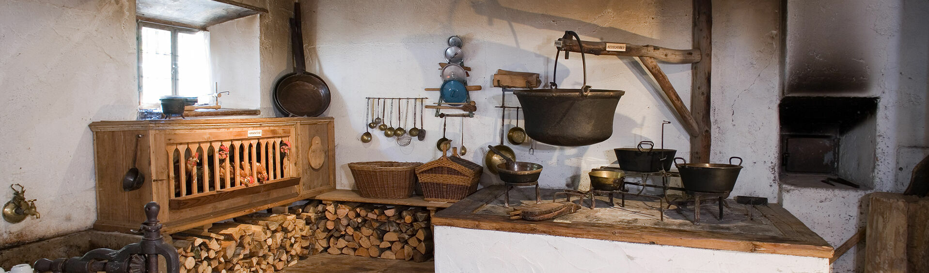 The old open-fire kitchen at the Achental museum of local history in Achenkirch am Achensee.
