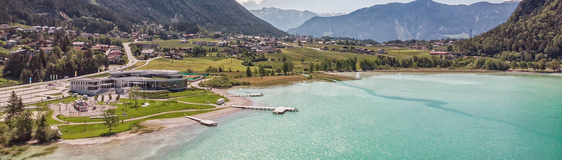 Aerial view of the Atoll Achensee in brilliant sunshine.
