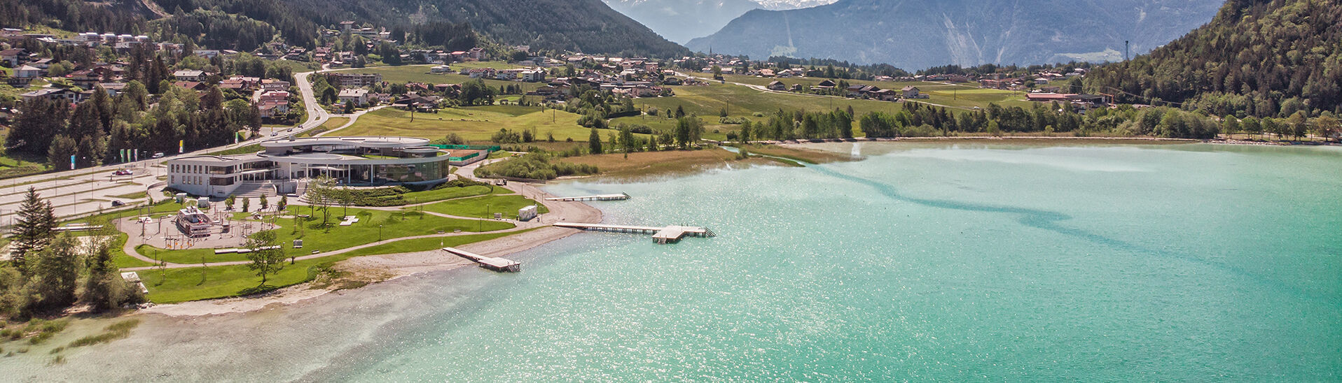 The Atoll in Maurach am Achensee Aerial view of the Atoll Achensee in brilliant sunshine.