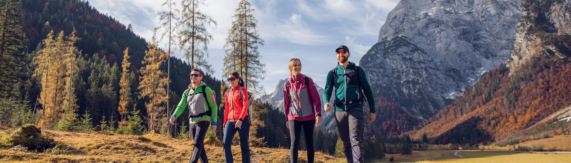 Autumn hike in the Nature Park Karwendel A group of friends take advantage of the beautiful weather for an autumn hike through the colourful Falzthurntal valley in the Nature Park Karwendel.