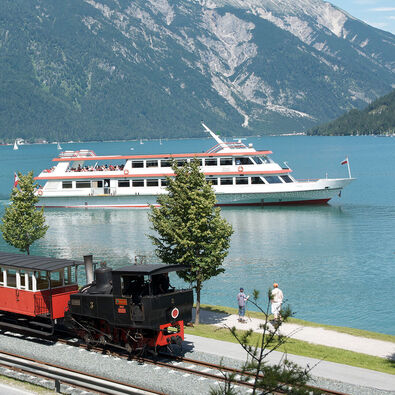 The launch of the Achenseeschifffahrt and the steam cog railway marked the beginning of tourism at Lake Achensee.