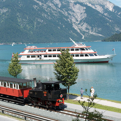 The launch of the Achenseeschifffahrt and the steam cog railway marked the beginning of tourism at Lake Achensee.