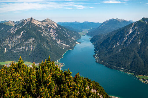The Bärenkopf in the Nature Park Karwendel affords spectacular views of Lake Achensee and its surrounding villages. 