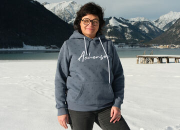 Barbara Noggler of Achensee Tourism on the lakeshore in Maurach am Achensee.