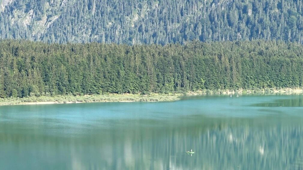 two mountain bikers - on the way on the Rotwandalm towards Bächental and Sylvensteinstausee