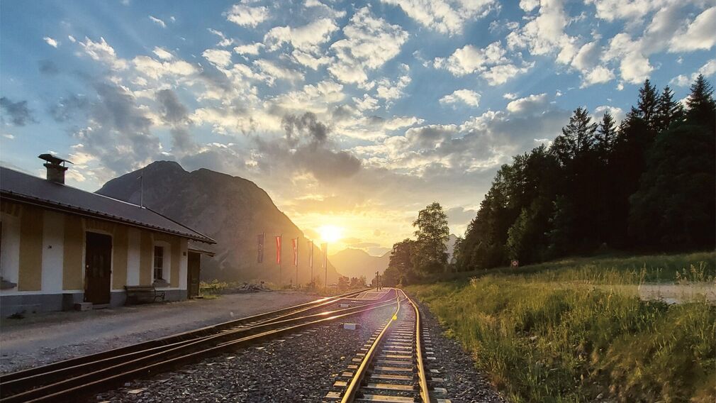 Achenseebahn steam cog railway station in Eben am Achensee at sunset.