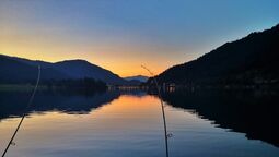 fishing on lake Achensee at sunset