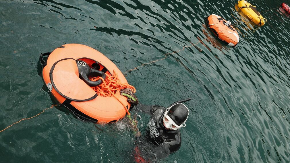 Freediving in Schwarzenau on Lake Achensee. The bay between Maurach and Achenkirch is a popular swimming area and home to the Schwarzenau Campsite.